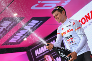 TIRANA, ALBANIA - MAY 09: Francesco Busatto of Italy and Team Intermarche - Wanty celebrates at podium as White best young jersey winner during the 108th Giro d'Italia 2025, Stage 1 a 160km stage from Durres to Tirana / #UCIWT / on May 09, 2025 in Tirana, Albania. (Photo by Tim de Waele/Getty Images)