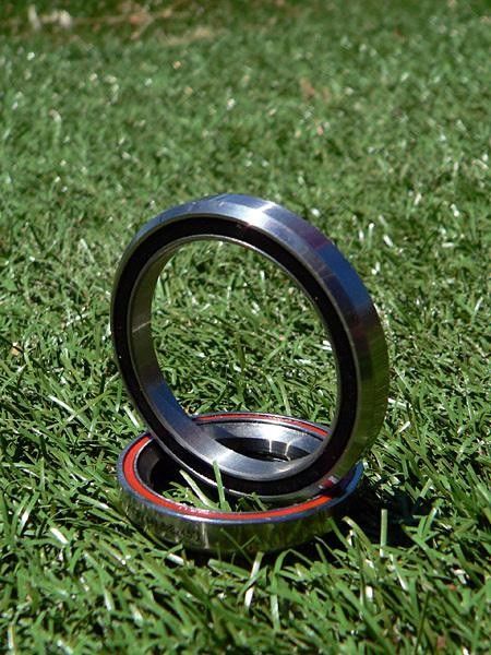 The new lower headset bearing dwarfs the "oversized" 1 1/8" unit.