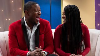 Jarrette and Iyanna laughing at the Love Is Blind season 3 reunion