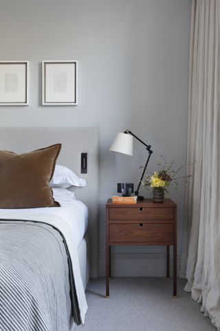 A grey carpet in a bedroom