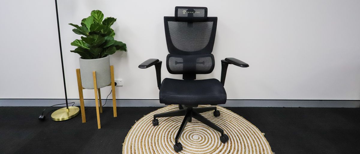 The ErgoTune Supreme V3 office chair on a round rug