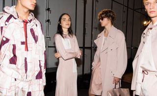 Models wear pastel dress, coat, shorts and geometric patterned jacket