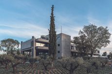 Greek brutalist gem AGET Iraklis by Alexandros Tombazis redesigned by Georges Batzios, clean concrete and marble and stone surfaces and shapes