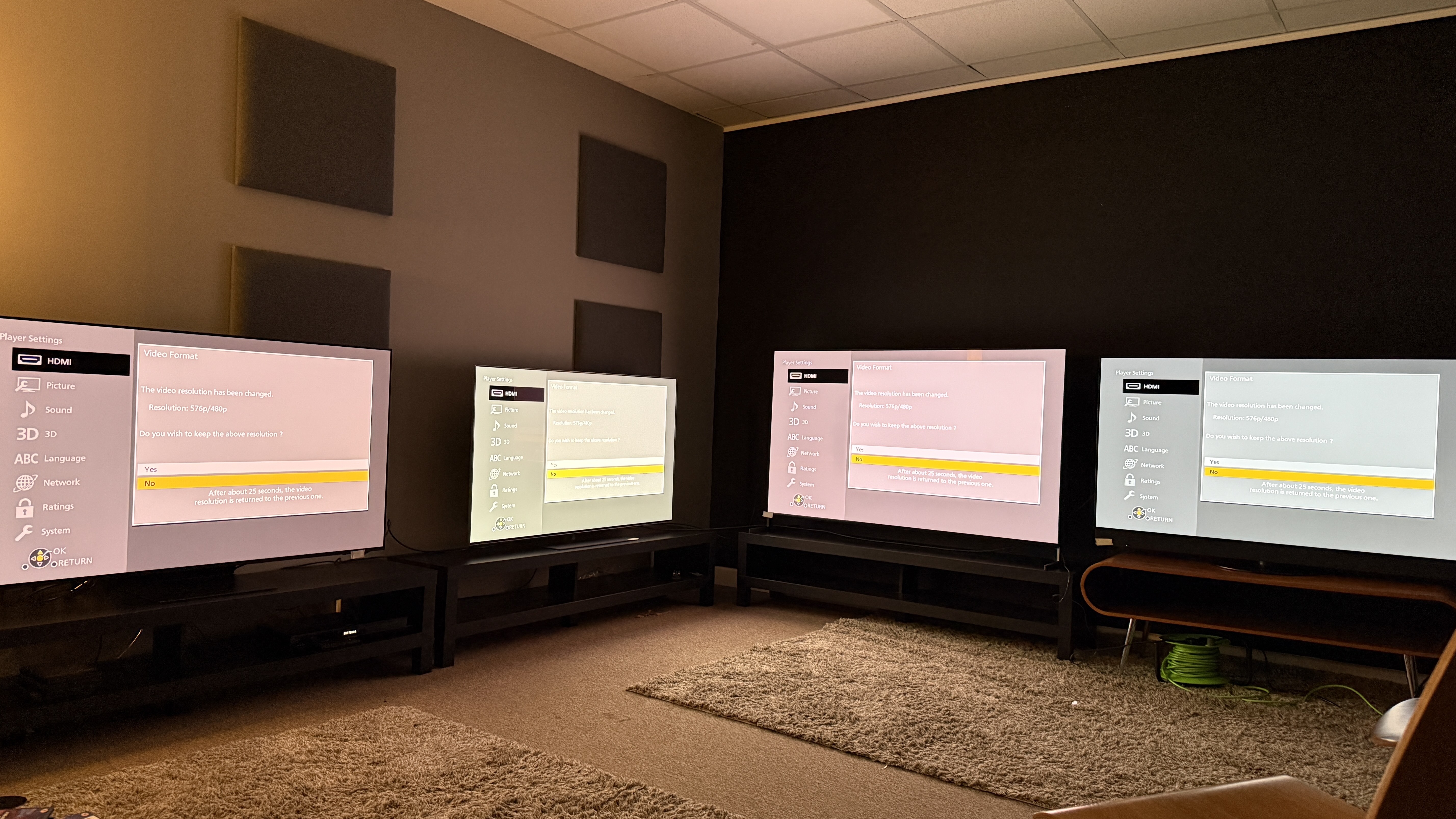 Samsung S95F (far left) LG G5 (middle left) Sony Bravia 8 II (middle right) Panasonic Z95B (far right) OLED TVs all displaying Panasonic DP-UB820 480p notification in settings menu