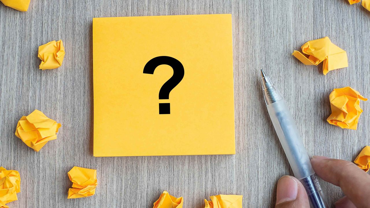 A Post-It Note with a question mark.