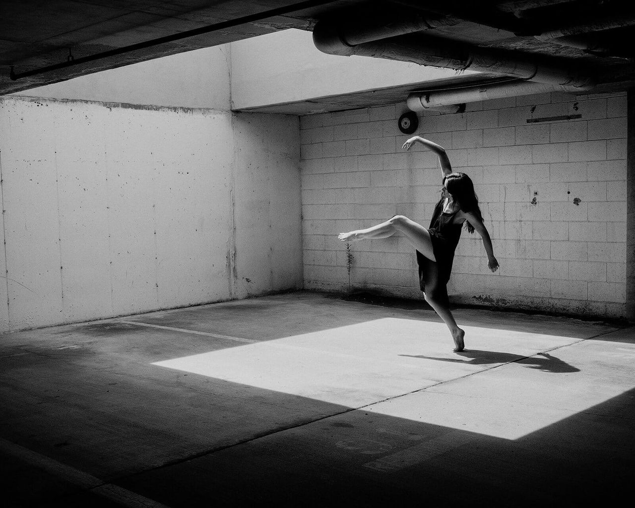 Monochrome frame of woman dancing.