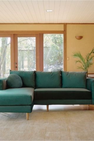 Sabai Design The Essential Sectional sofa in green velvet with chaise on left