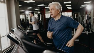 Senior man running on treadmill
