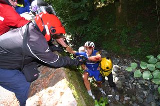 Philippe Gilbert is rescued from the ravine on the Col du Portet d'Aspet in the 2018 Tour de France