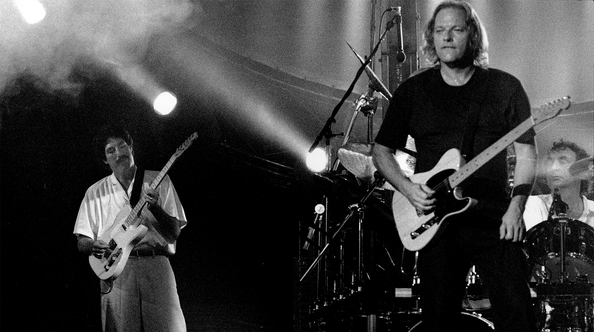 Former Columbia Records exec Paul Rappaport performs onstage with David GIlmour and Pink Floyd 