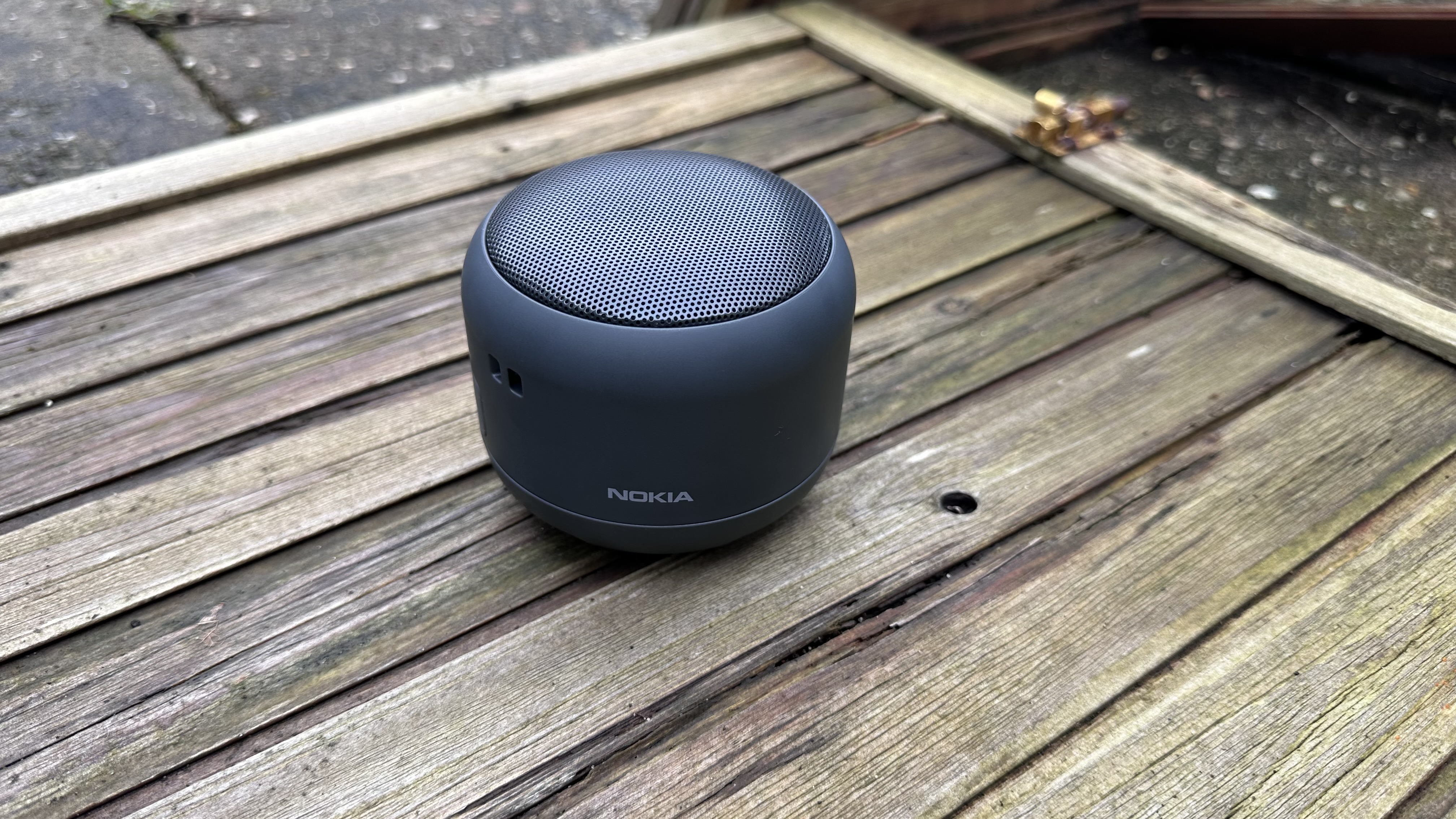 The Nokia Portable Wireless Speaker 2 on a wooden surface.