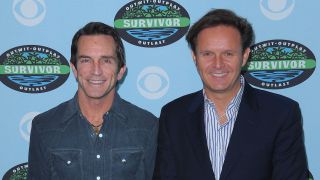 Jeff Probst and Mark Burnett smiling at the Survivor 10-year anniversary party.