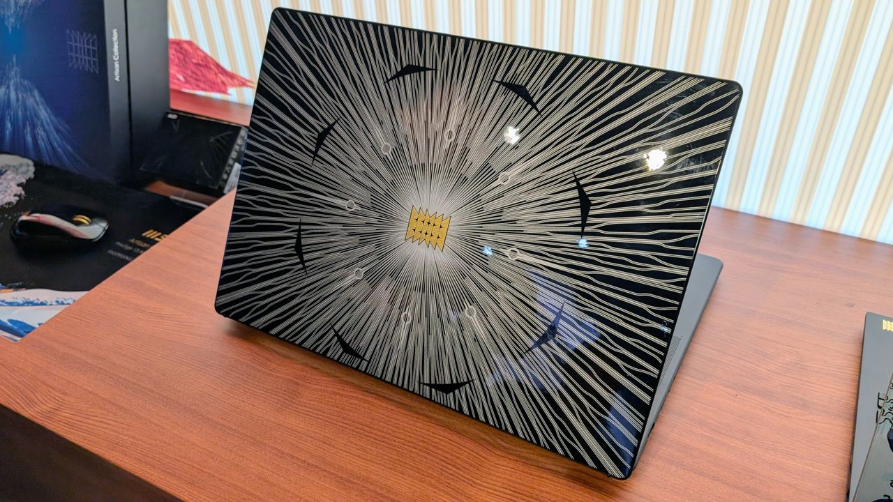 MSI Prestige 13 laptop with artwork at Computex 2025