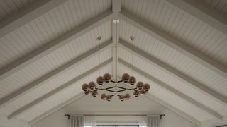 vaulted ceiling with modern chandelier
