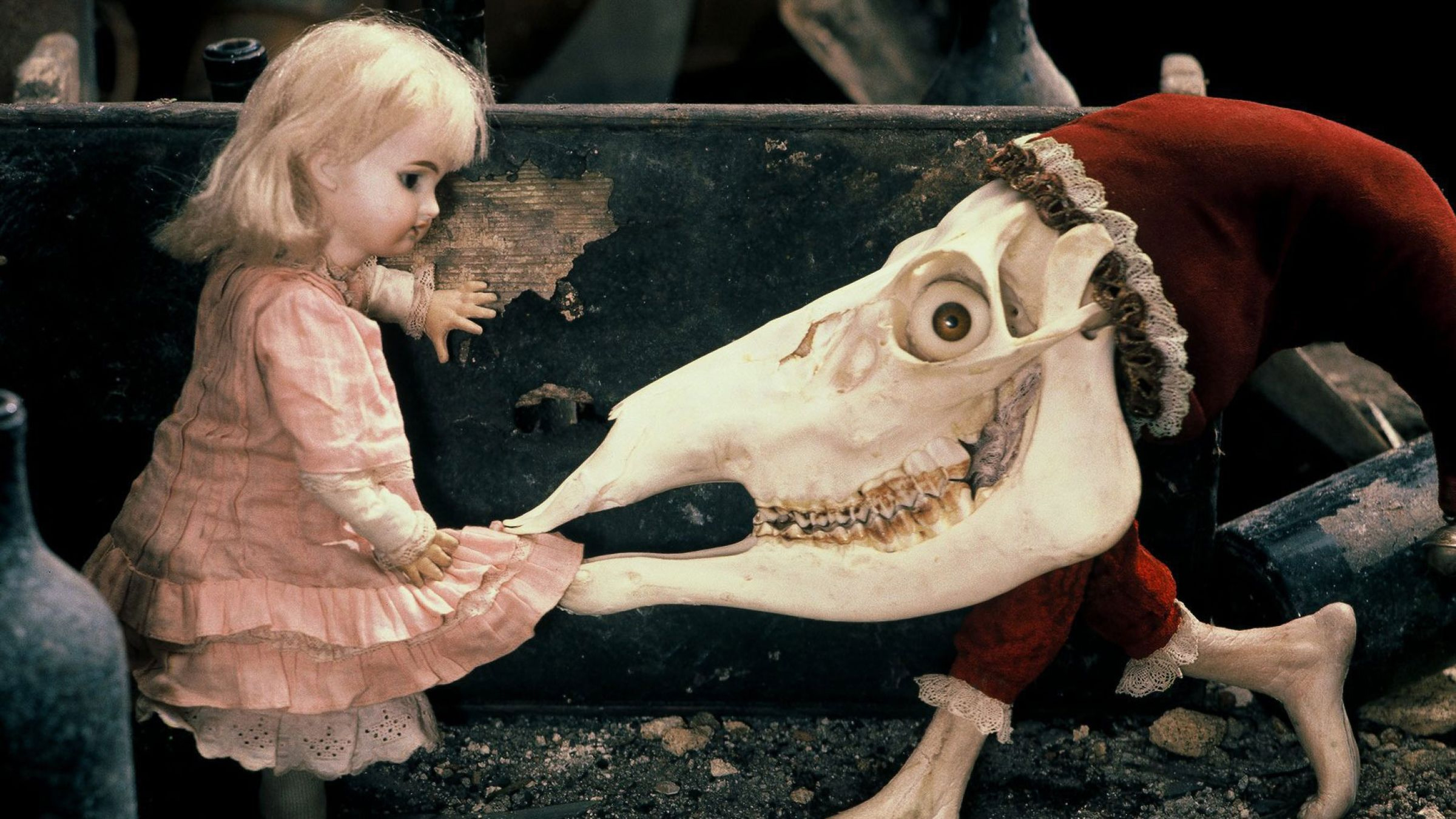 Best cartoons of the 1980s; a skull bits a dolls dress