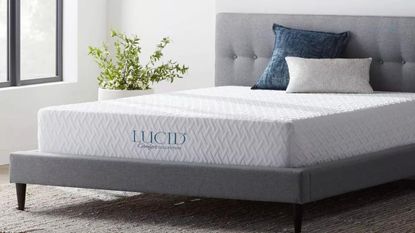 Best cheap mattress from Lucid on grey bedframe with yellow cushion