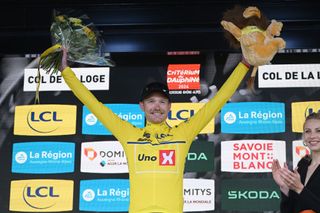 COL DE LA LOGE FRANCE JUNE 03 Magnus Cort Nielsen of Denmark and Team UnoX Mobility celebrates at podium as Yellow leader jersey winner during the 76th Criterium du Dauphine 2024 Stage 2 a 142km stage from Gannat to Col de la Loge 1251m UCIWT on June 03 2024 in Col de la Loge France Photo by Dario BelingheriGetty Images
