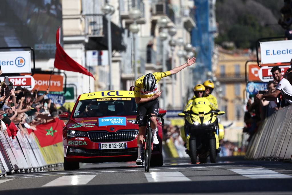 UAE Team Emirates Slovenian rider Tadej Pogacar wearing the overall leaders yellow jersey celebrates as he crosses the finish line of the 8th and final stage of the 81st Paris Nice cycling race 1175 km between Nice and Nice on the Promenade des Anglais of the French riviera city of Nice southeastern France on March 12 2023 Photo by AnneChristine POUJOULAT AFP Photo by ANNECHRISTINE POUJOULATAFP via Getty Images