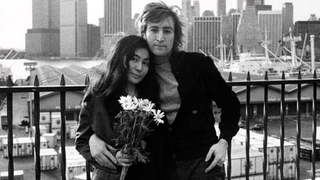 Yoko Ono and John Lennon together on rooftop in New York