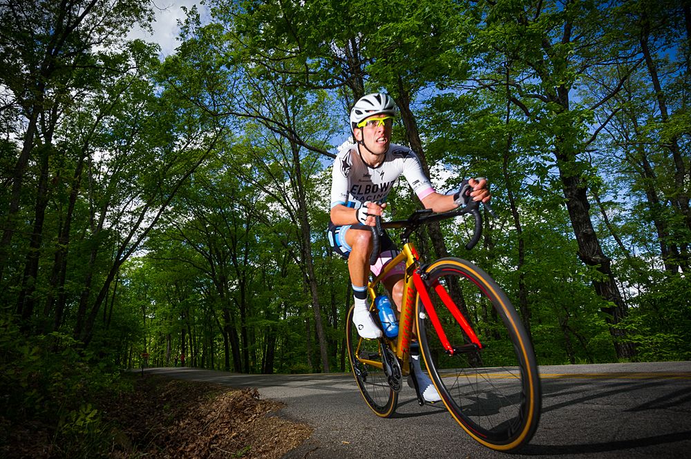 An ELBOWZ Racing (USA) rider showing a little grit as he winds his way up the switchback section of the course.