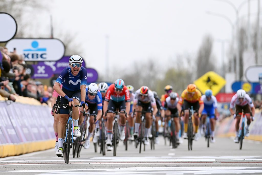 WAREGEM BELGIUM MARCH 29 Oier Lazkano Lopez of Spain and Movistar Team celebrates at finish line as second place during the 77th Dwars Door Vlaanderen 2023 Mens Elite a 1837km one day race from Roeselare to Waregem DDV23 on March 29 2023 in Waregem Belgium Photo by Tim de WaeleGetty Images