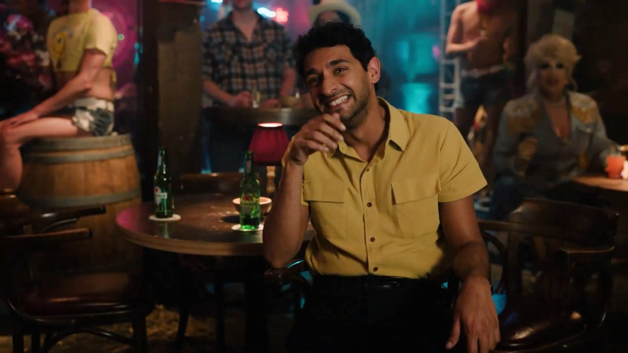 Karan Soni smiling in a Nice Indian Boy.