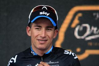 Sergio Henao (Sky) on the podium to receive white jersey for best young rider.