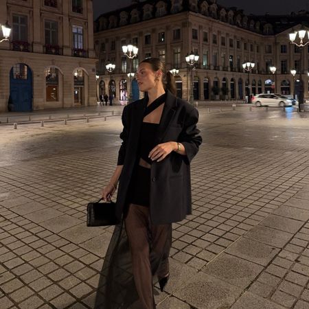 Woman walking through the streets of Paris