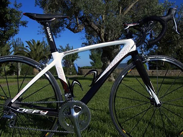 A taller head tube and longer chain stays make for a more upright fit and more stable handling.