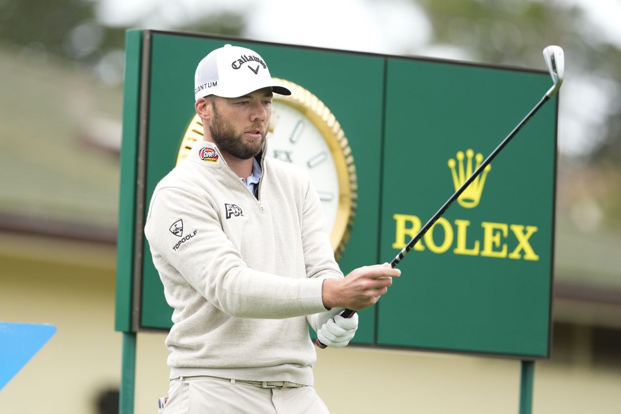 Sam Burns prepares to hit his tee shot on the first hole during the final round of AT&amp;T Pebble Beach Pro-Am at Pebble Beach Golf Links