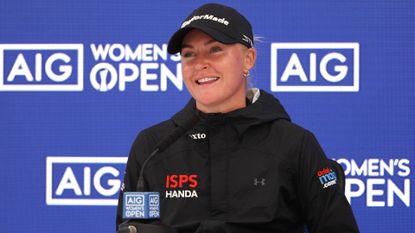 Charley Hull addresses a press conference ahead of the AIG Women's Open at Walton Heath Golf Club