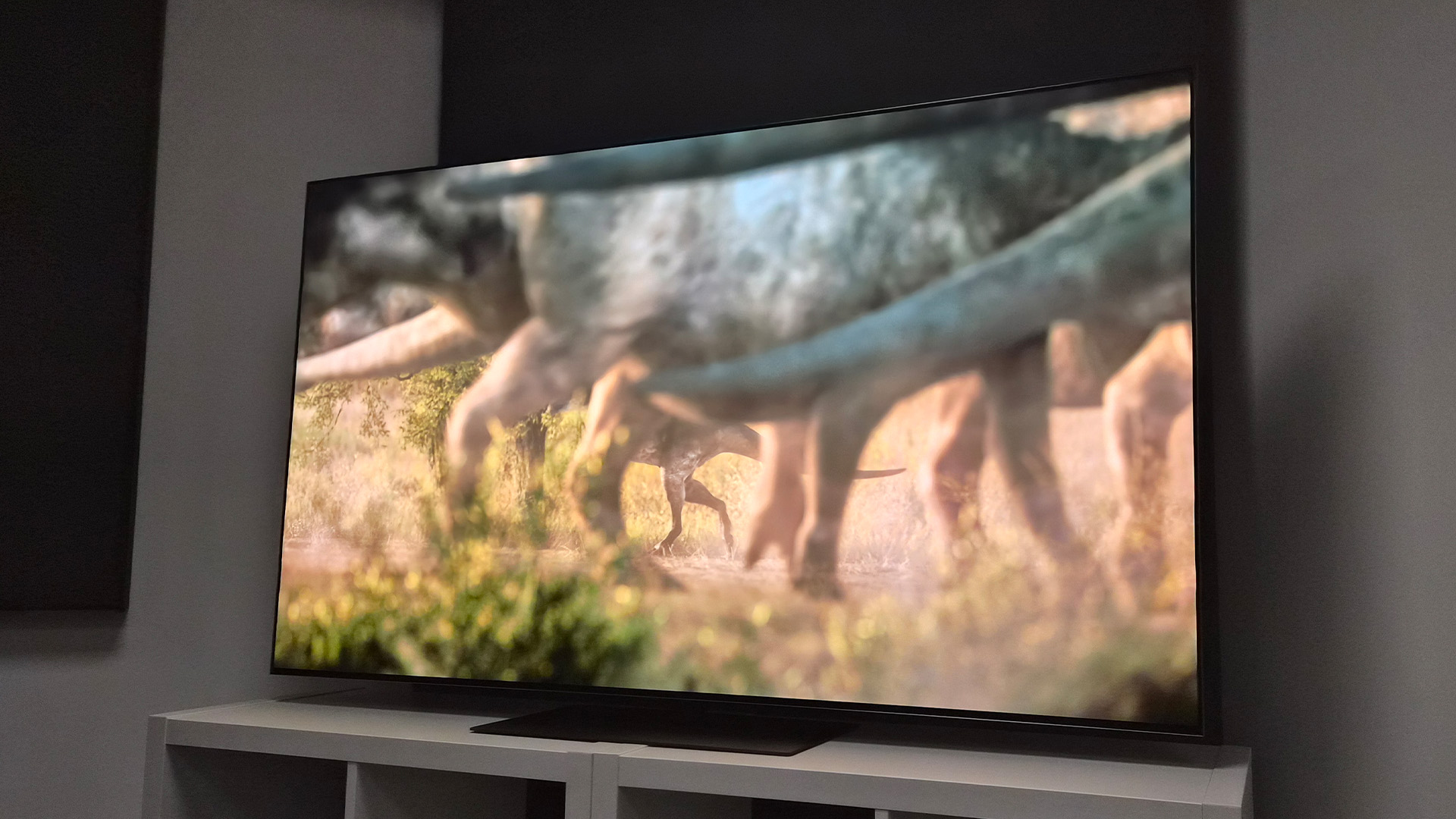 LG G6 (OLED65G6) OLED TV, on screen are dinosaurs