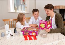 Fun activities for kids: Galt Toys Horrible Science Explosive Experiments: girl, boy and man playing with the kit on table