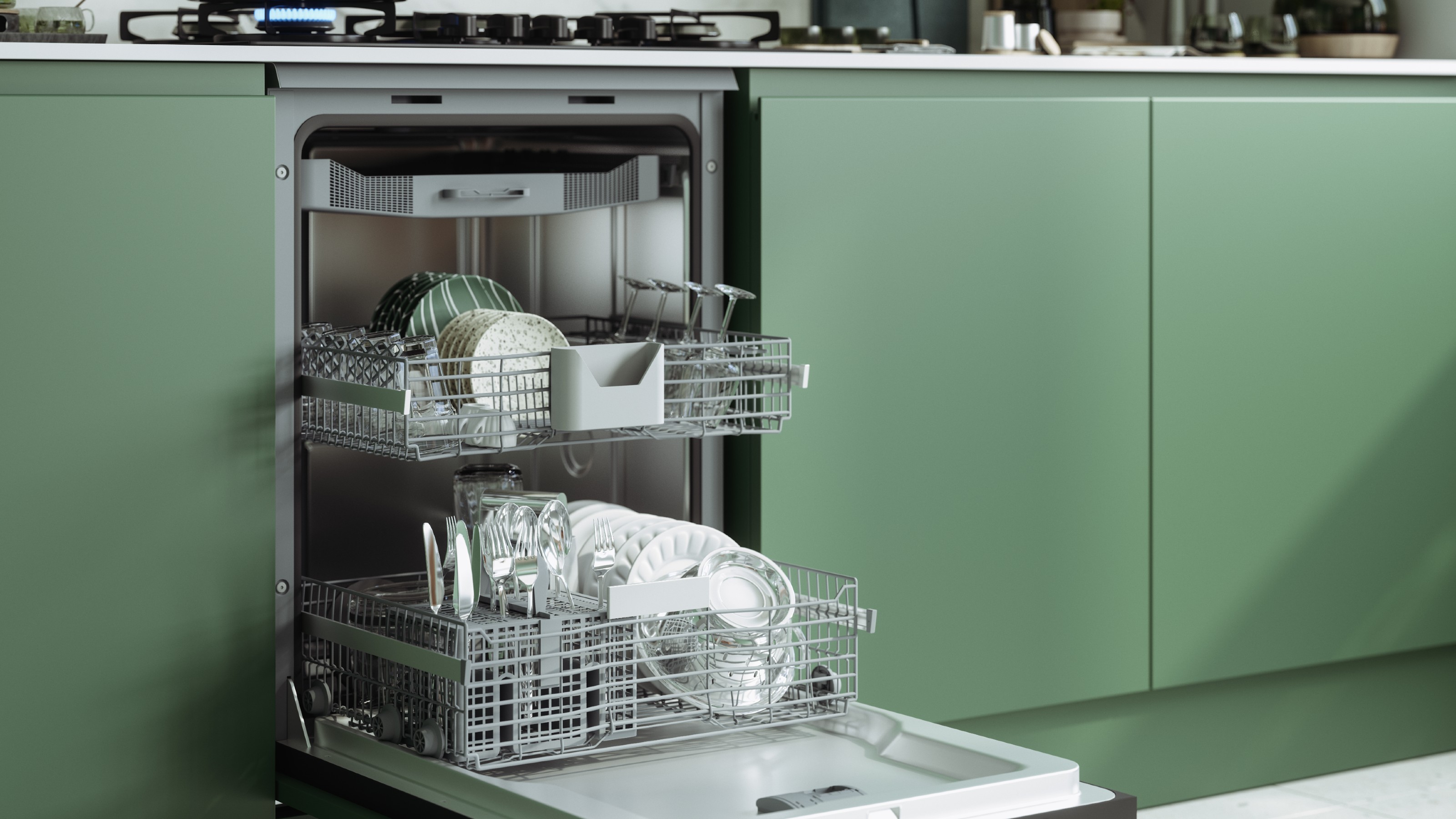 Stacked dishwasher with open door in kitchen with green cabinets
