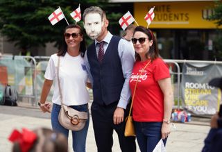 England supporters with a fellow fan dressed as Gareth Southgate