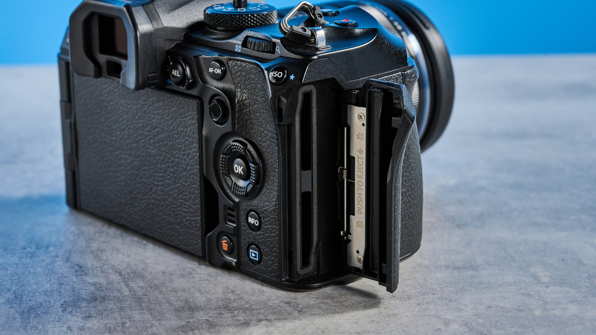 A black OM System OM-1 Mark II Micro Four Thirds mirrorless camera