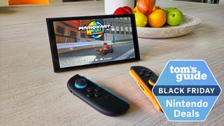 Nintendo Switch 2 with Mario Kart World on the screen and a Tom's Guide deal badge added for Black Friday