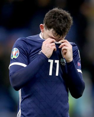 Scotland’s Oliver Burke looks dejected after the defeat to Kazakhstan