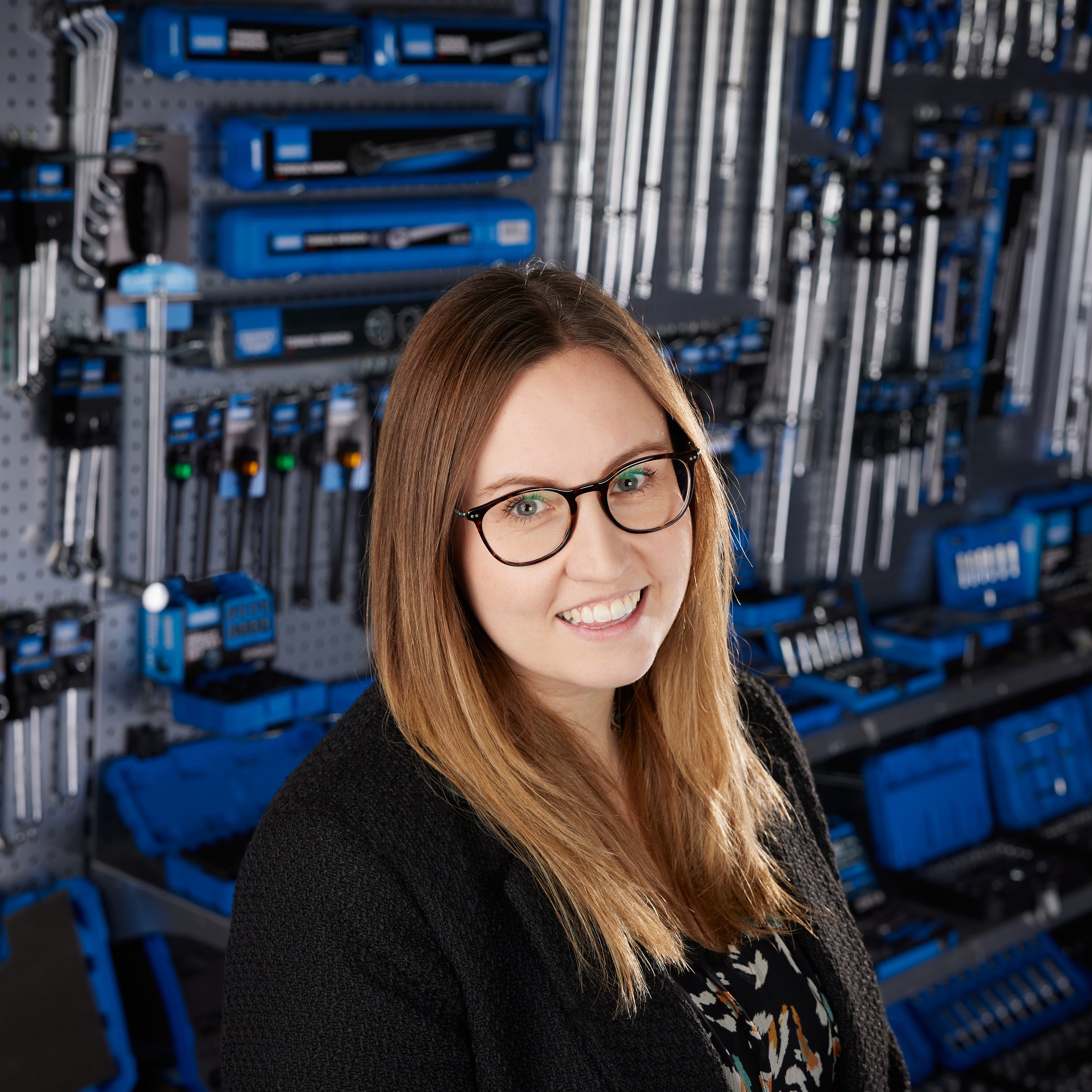 Draper Tools marketing director, Darah Hartland, photographed in front of an array of tools