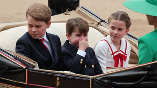Prince George of Wales, Princess Charlotte of Wales and Prince Louis of Wales ride in a horse drawn carriage with Catherine, Princess of Wales and Queen Camilla during Trooping the Colour at Horse Guards Parade on June 17, 2023 in London, England