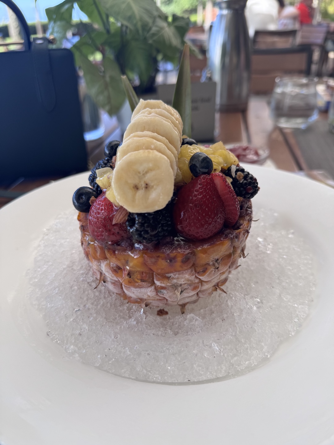 An acai bowl served in a pineapple