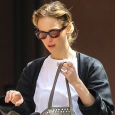 Jennifer Lawrence traded the flip-flop trend for striped Adidas sandals in NYC