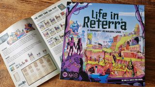 Life in Reterra box and instructions on a wooden table