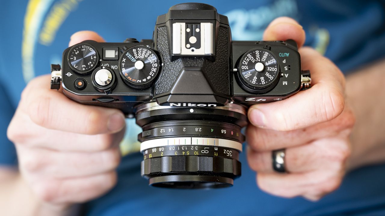 Voigtlander D 35mm f1.2 Nokton lens in the hand