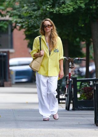 jennifer lawrence wearing a boho chic spin on the jelly sandals trend in new york city