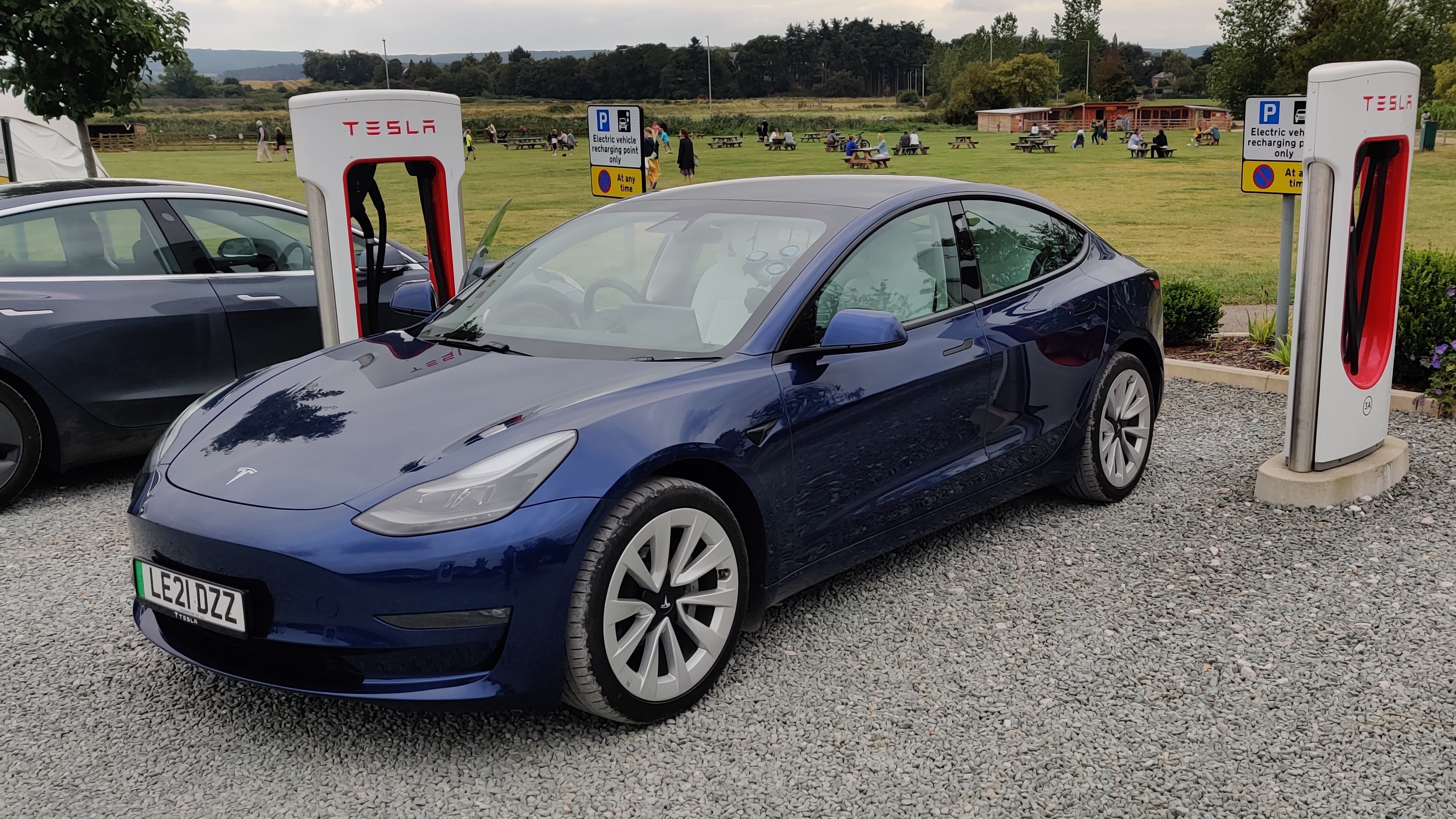 Tesla Model 3 in a supercharger