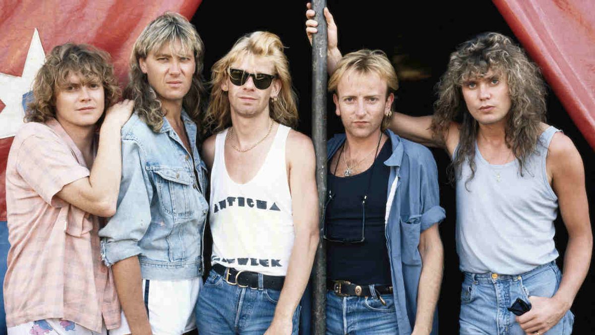 Def Leppard posing for a photo outside a circus tent in 1987