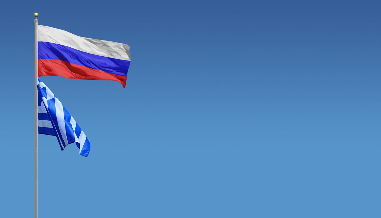 Russian flag on top of Greek flag