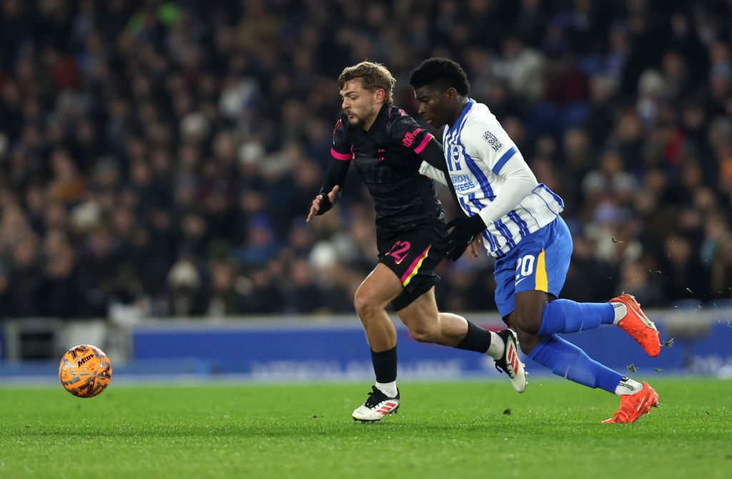 Kiernan Dewsbury-Hall of Chelsea battles for possession with Carlos Baleba of Brighton &amp; Hove Albion during the Emirates FA Cup Fourth Round match between Brighton &amp; Hove Albion and Chelsea at Amex Stadium on February 08, 2025 in Brighton, England.