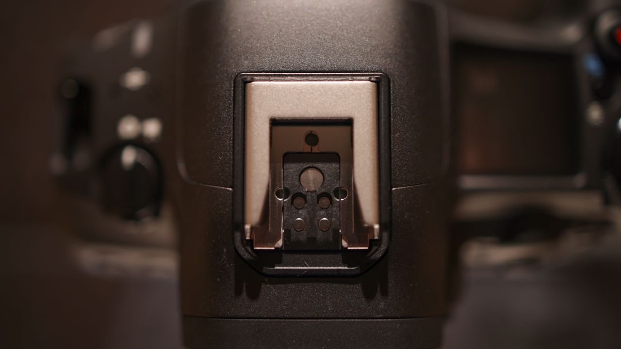Canon EOS R5 Mark II against a dark background